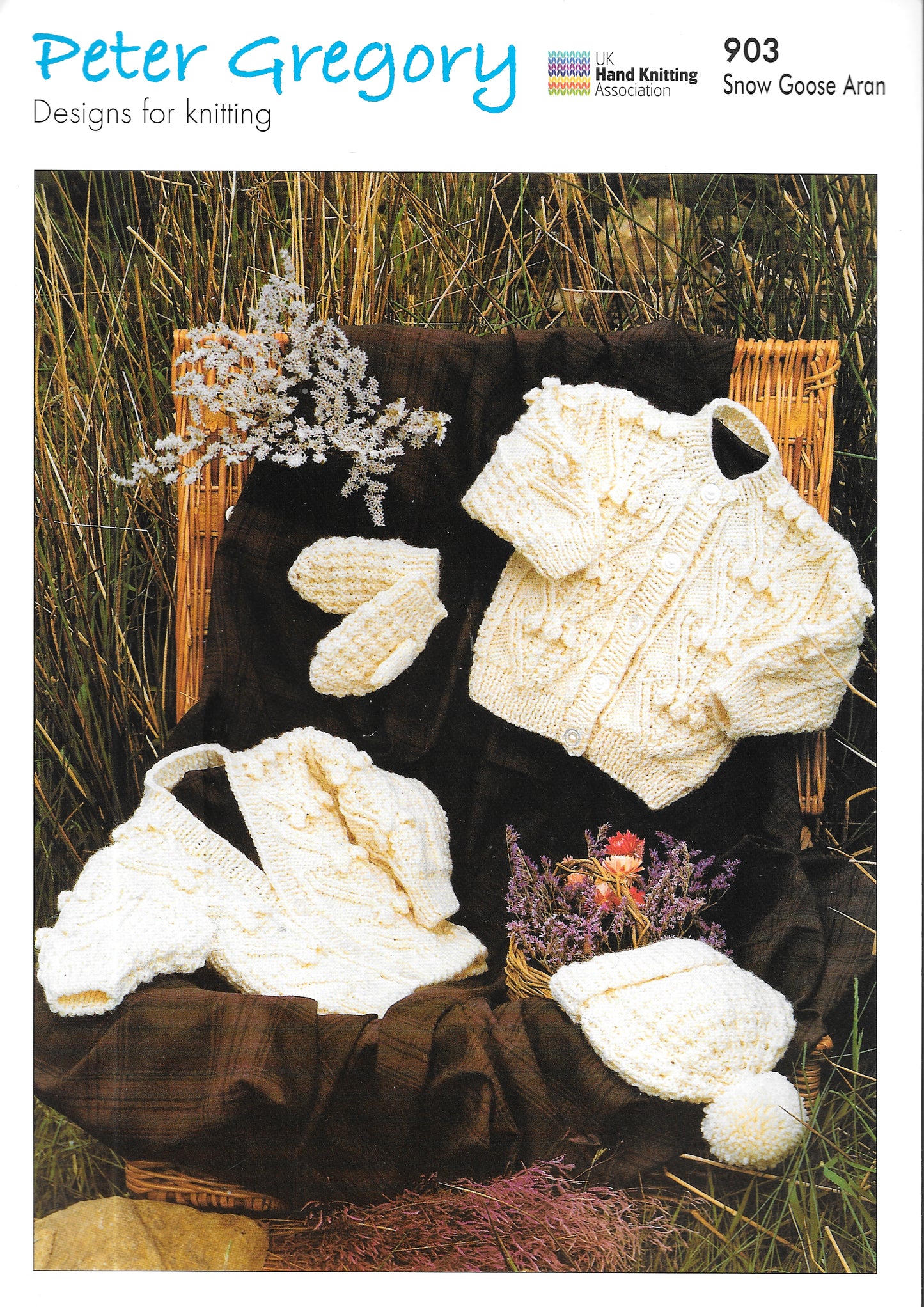 903 Peter Gregory knitting pattern. Child's cardigans and hat. Aran