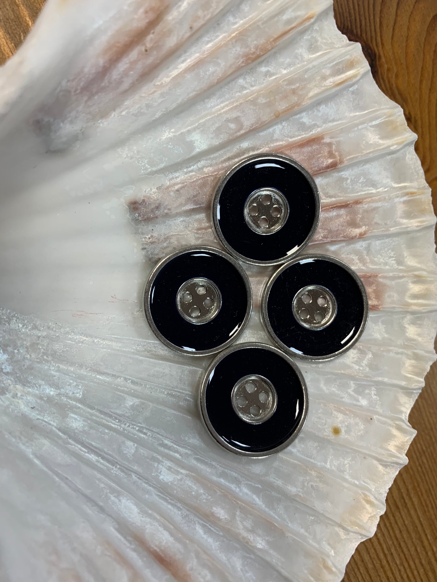 Silver and Black Metal Buttons